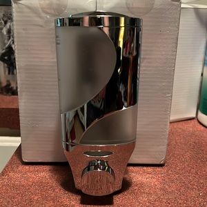 Shower and bath wall mounted soap dispenser